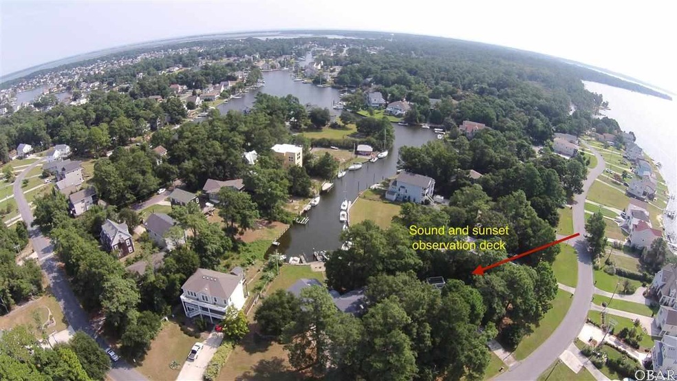 sits on 4 canalfront lots