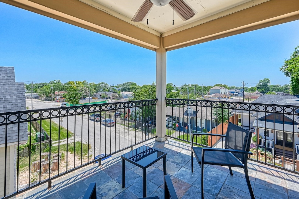 Spacious rooftop patio with stunning city views.