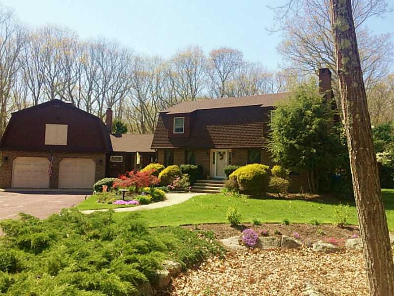 Exterior Front. Gorgeous landscaping surrounds thi
