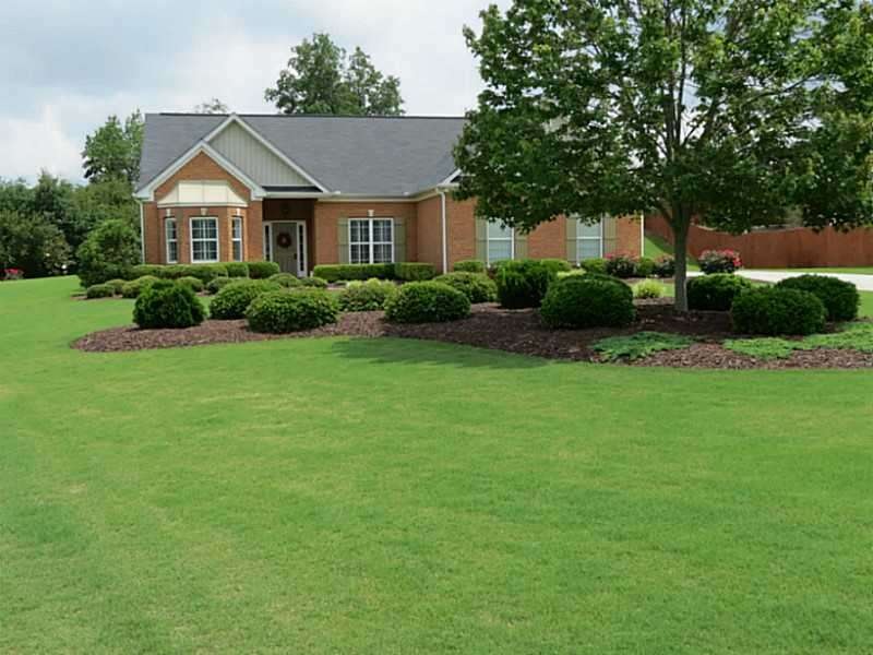 Exterior Front. All Brick Beauty on .8 acres super