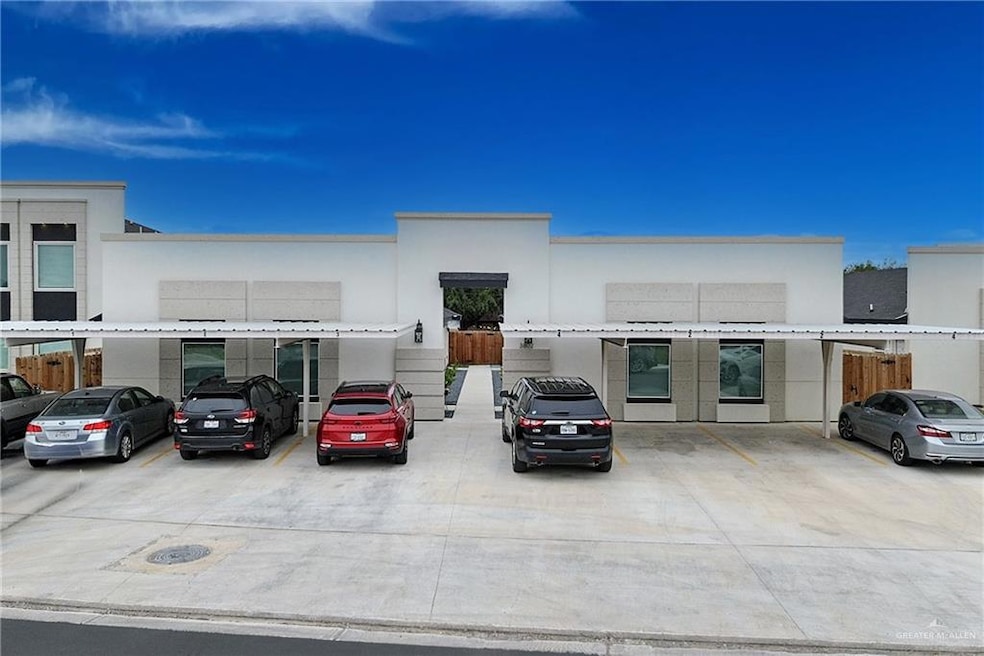 View of front of house featuring covered parking