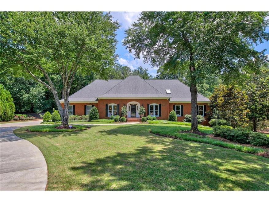 Spectacular all brick home with master on main and