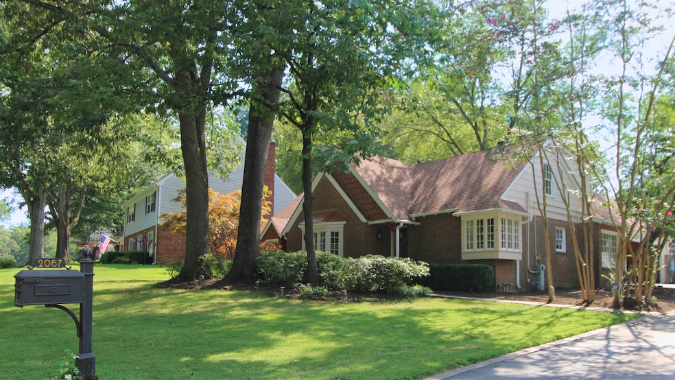 View of front of home featuring a front lawn