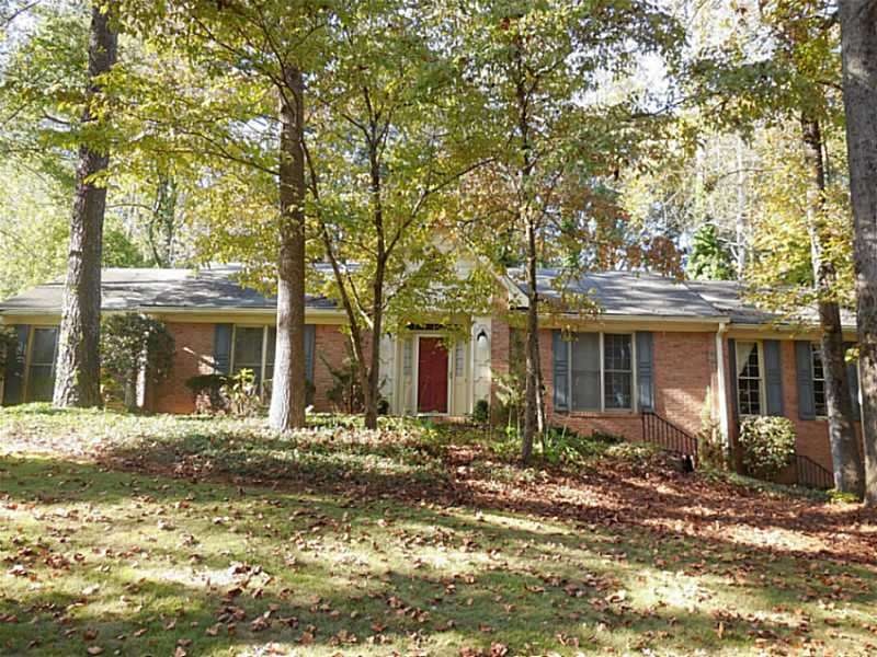 Exterior Front. Beautiful 3 sided Brick Ranch on p