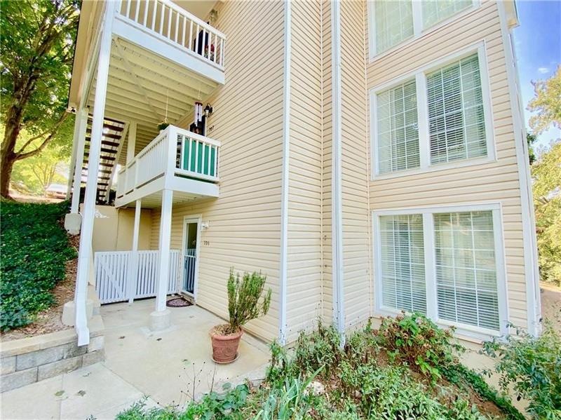 BEAUTIFUL GARDEN LEVEL, END UNIT CONDO