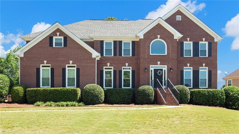 Loads of curb appeal in 3 sided brick executive ho