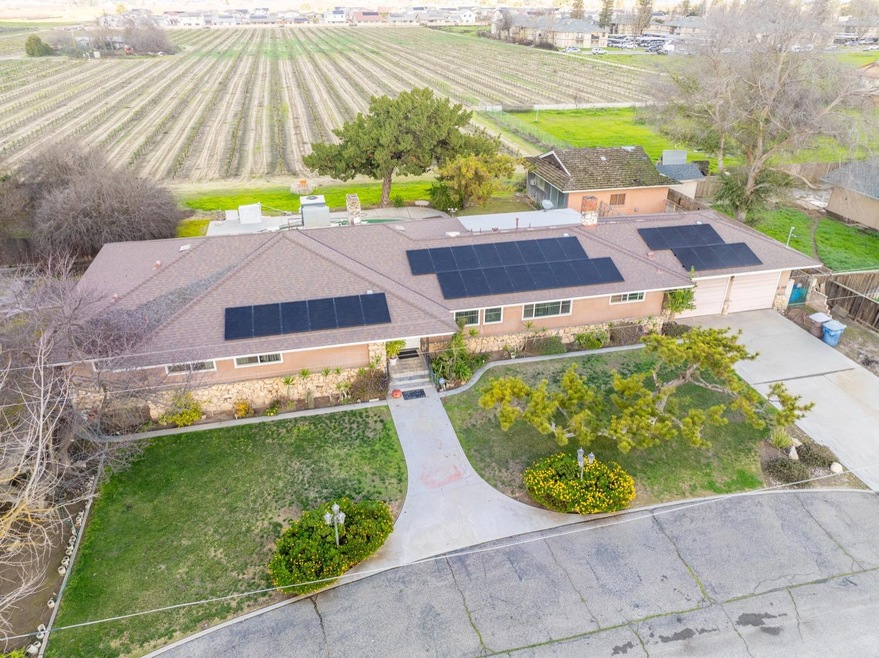 Photo provides a front view of the home and 17 acr