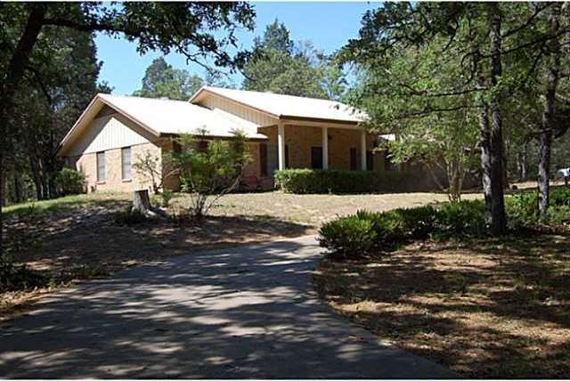 Nice 3/2 Brick home nestled in 9.88 tree scattered