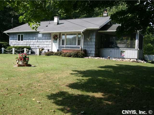 Exterior Front. On over 28 acres this well built o