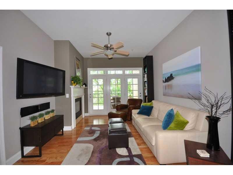 Exterior Front. Great Room featuring hardwood floo