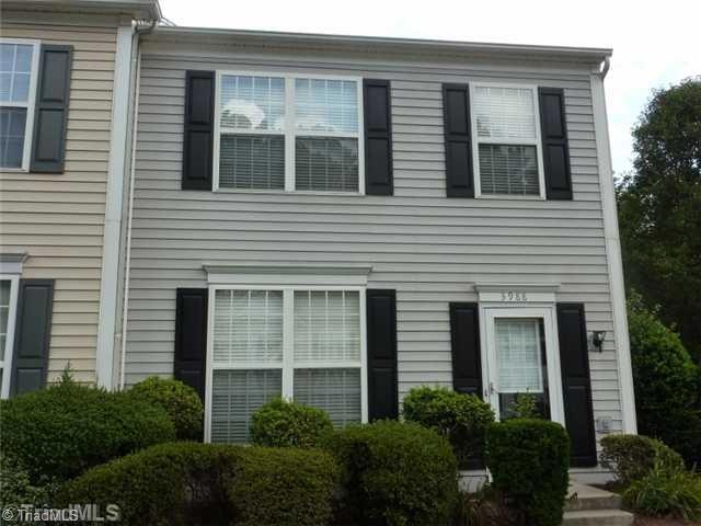 Exterior Front. End unit townhouse w/ priv back/side yd. 3 bedrm 2.5 bath townhouse. Cul de sac street. Freshly painted in neutral colors, new carpet, & formica count. in kitchn. Great location next to Wendover w/ Palladium SC, Bridford Pkwy Shopping, Interstate 73 & 40.