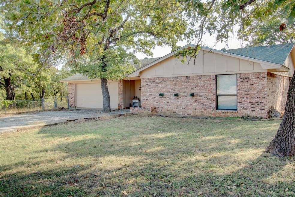 7707 Wolf Hollow, Millsap, TX 76066 - photo 1