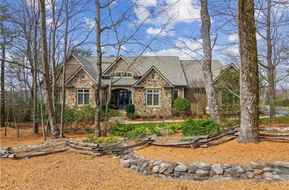 Craftsman-style home with stone siding