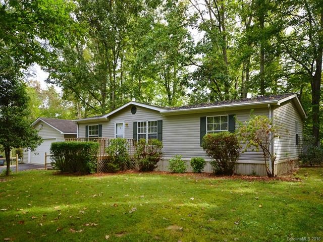 Peaceful setting at this home on this 1 + acre lot
