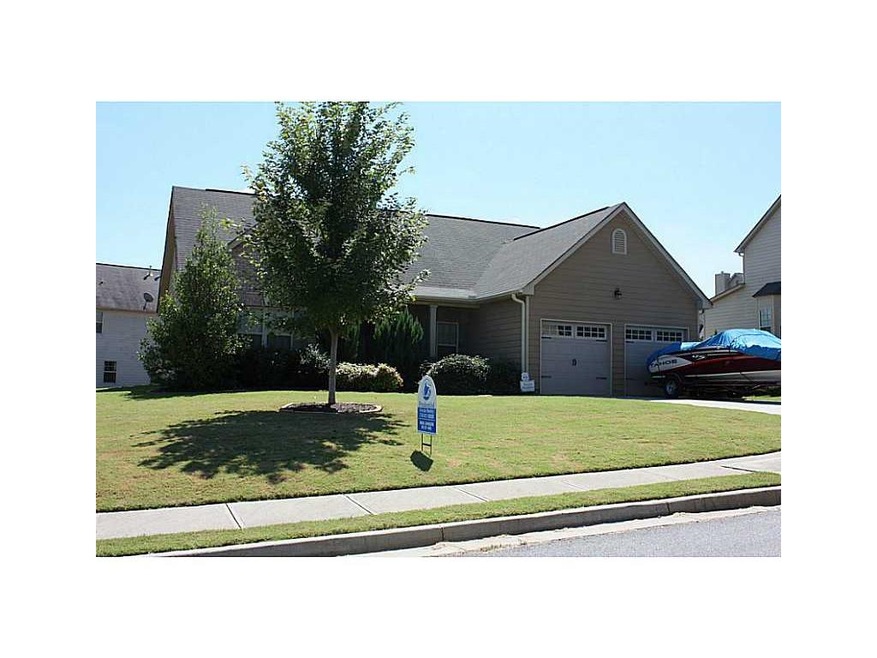 Exterior Front. Large flat yard.