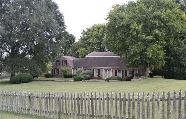 4B/3.5b home, 2 story home w/ storage building and mature trees.