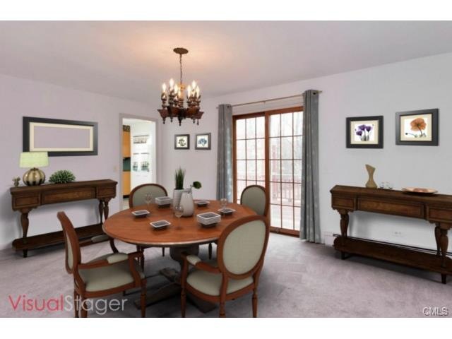 Dining Room with Sliders to the Oversized Deck mak