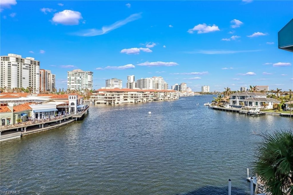 4th floor birds eye view of Venetian Bay and the Park Shore skyline