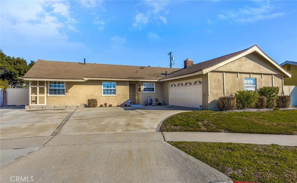 Newer exterior paint and plenty of off-street parking! There is an entrance to house from garage into hallway off of kitchen.