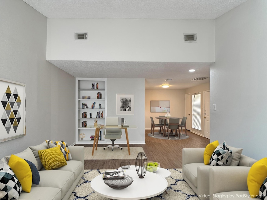 This modern condo has it all, including home office space! (virtually staged)