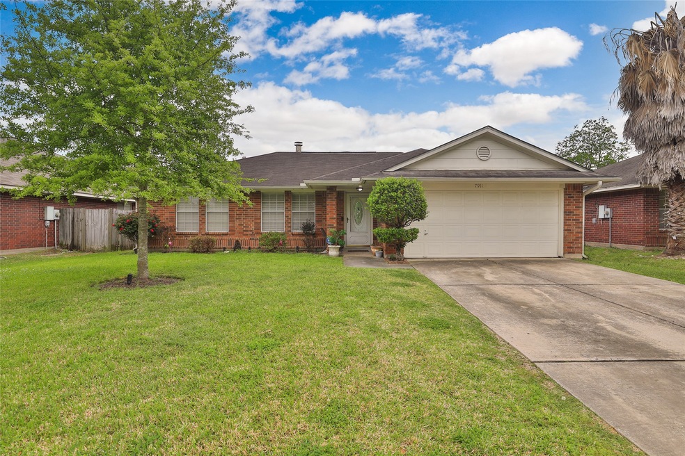 7911 Woodland Oaks Ct, Houston, TX 77040 - photo 1