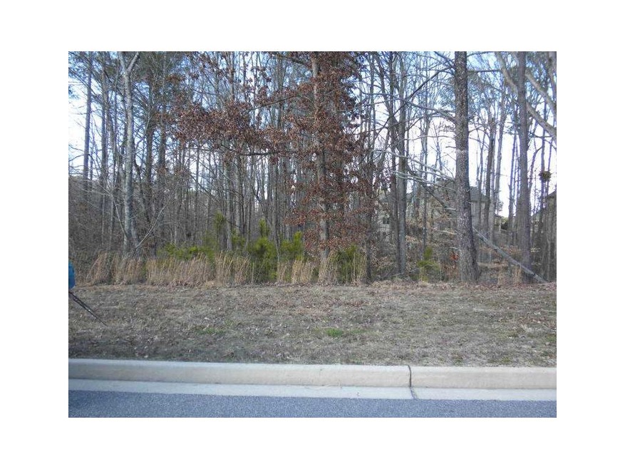 Exterior Front. Several trees on property.  Ready 