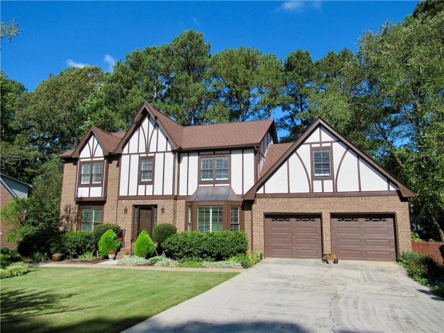 Stately Tudor home in sought out Riverwood neighborhood.