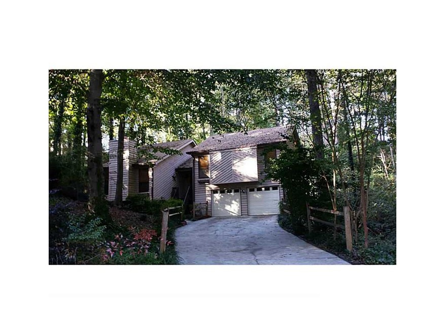 Exterior Front. Wooded cul de sac setting make thi