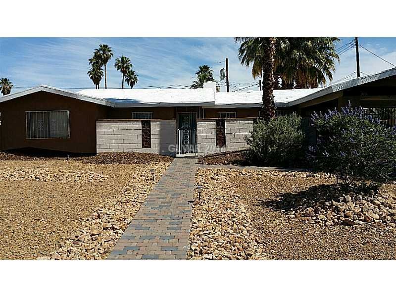 Property Photo. Front of house with cobblestone wa