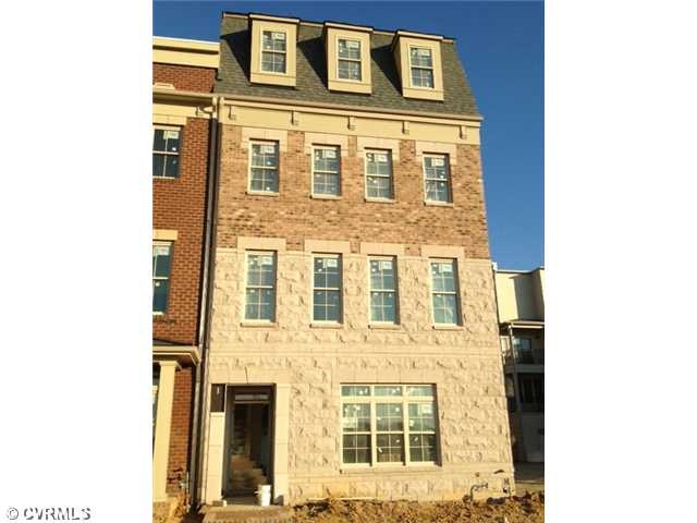 Exterior Front - Beautiful end home with brick and