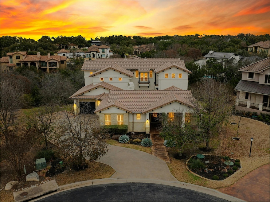 Mediterranean / spanish house featuring driveway 