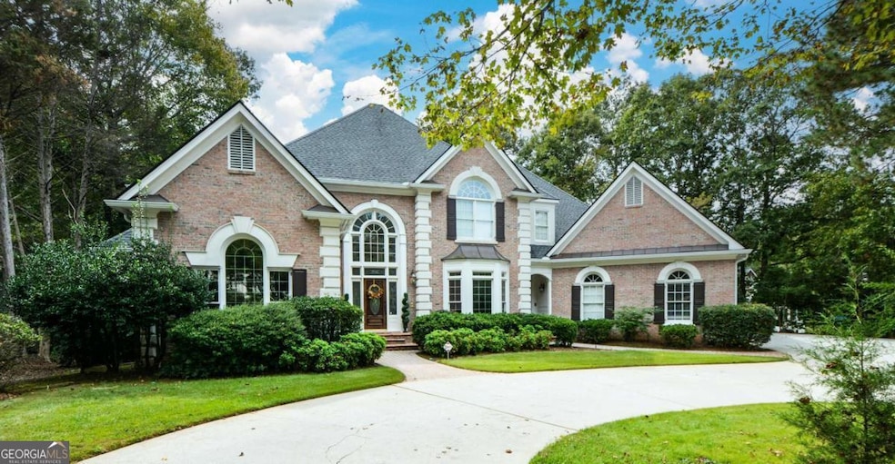 This custom Built, All Brick Estate is perfectly positioned on a private cul-de-sac lot with circular drive, offering timeless curb appeal and unmatched privacy.