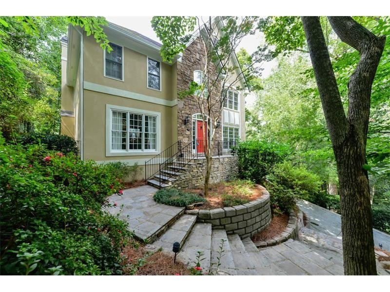 This newer traditional home is across the street f