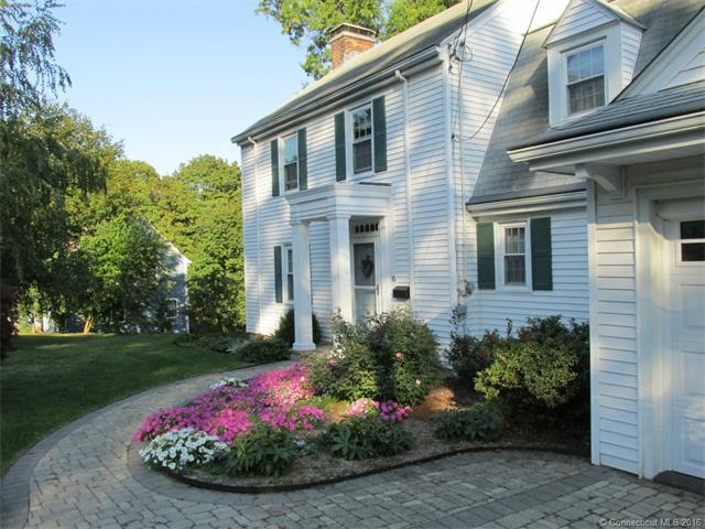 Beautiful stone driveway and walkway to portico en