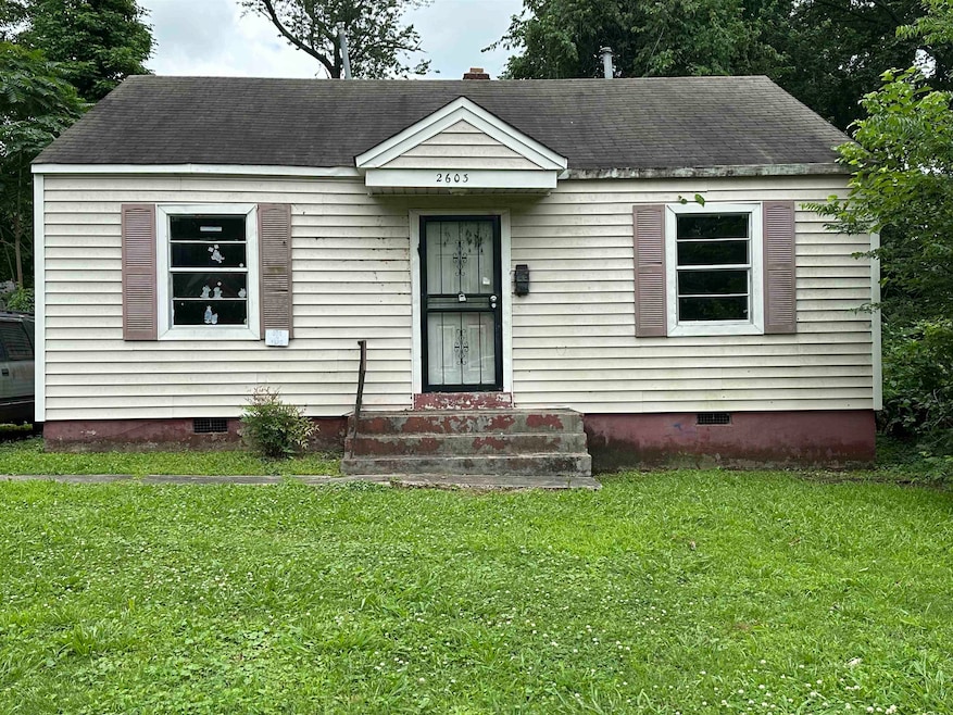 View of front facade with crawl space, a front lawn, roof with shingles, and entry steps