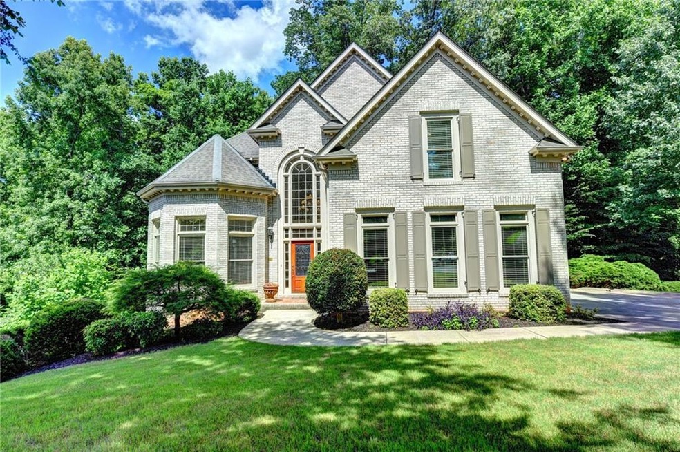 Four sided brick beauty on quiet cul-de-sac