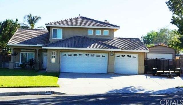 Front view of this beautiful home with RV parking.