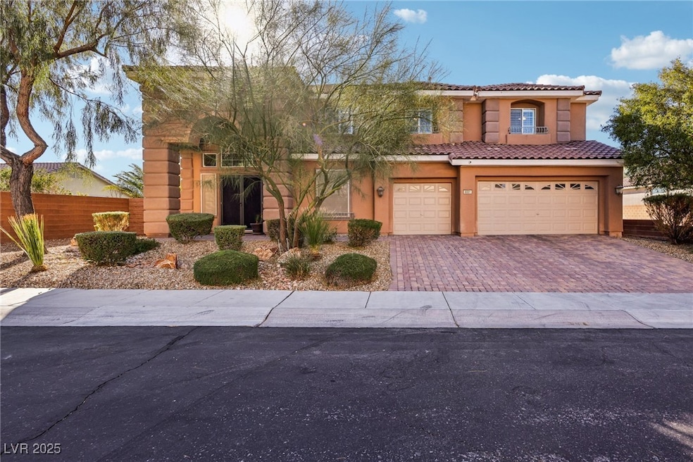View of front of home with fence, stucco siding, a