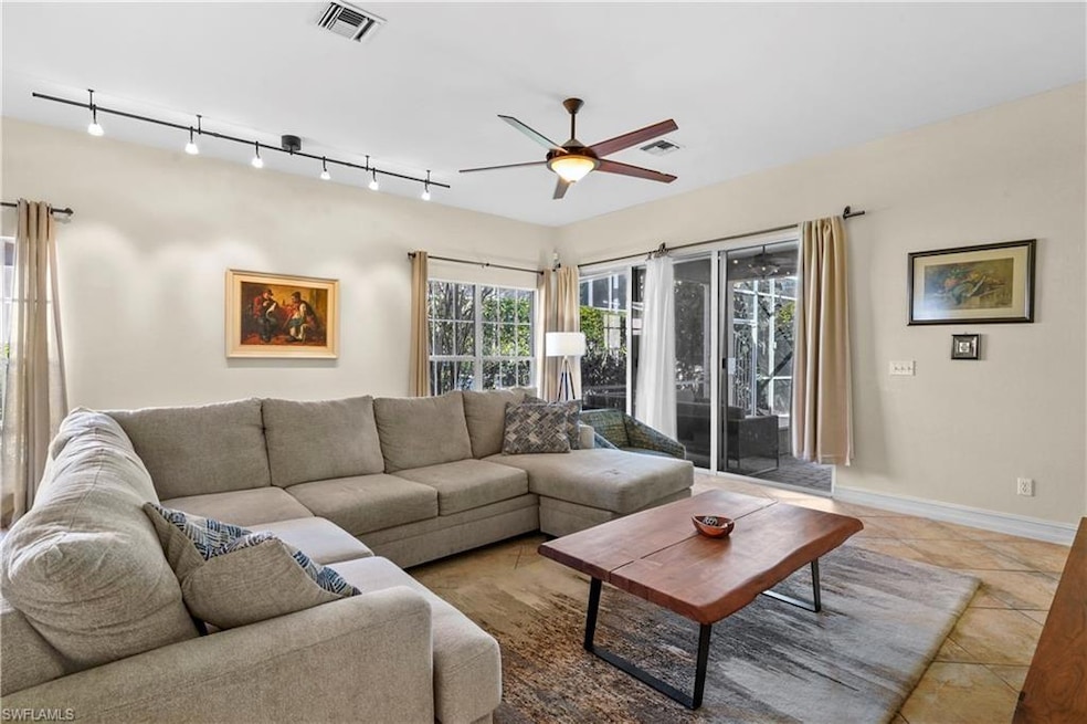 Living room featuring light tile patterned floors 