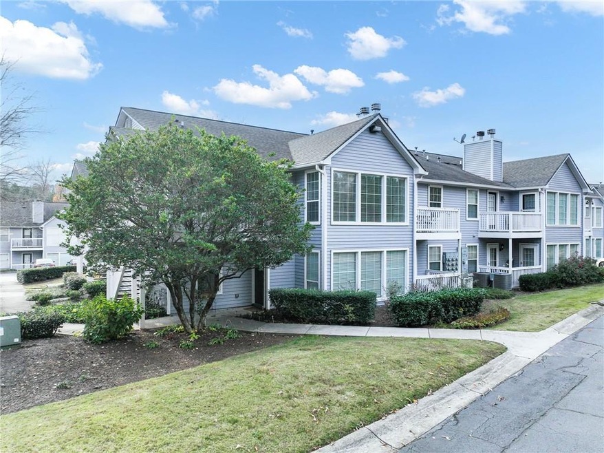 Townhome / multi-family property featuring a front