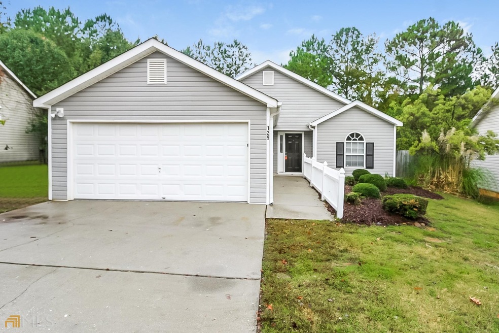 129 Brandon Ridge Cir, Stockbridge, GA 30281 - photo 1