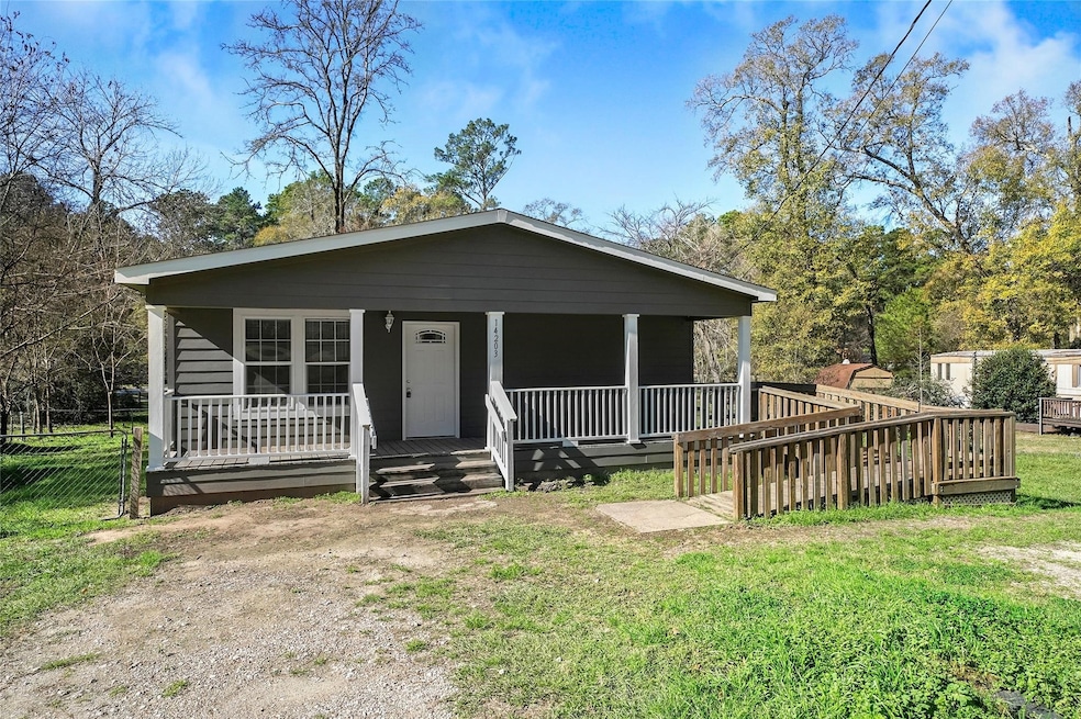 14203 E Ravine Run, Willis, TX 77318 - photo 1