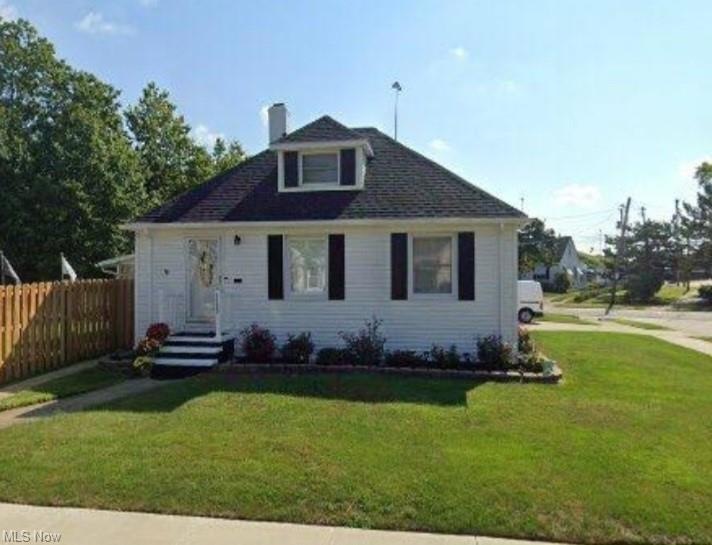 Bungalow-style house featuring a front yard