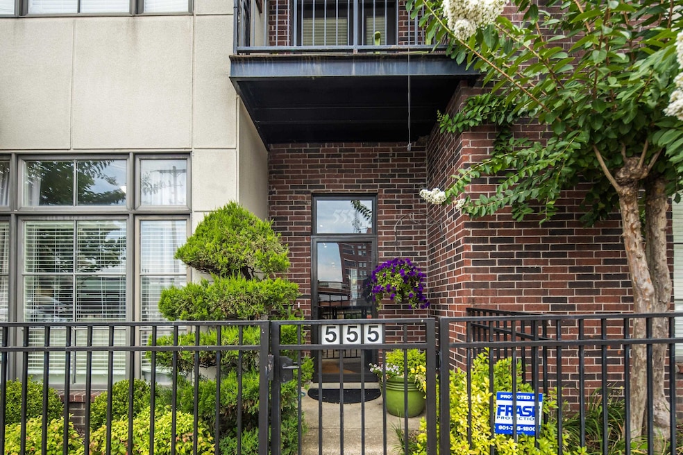 Entrance to property with brick siding