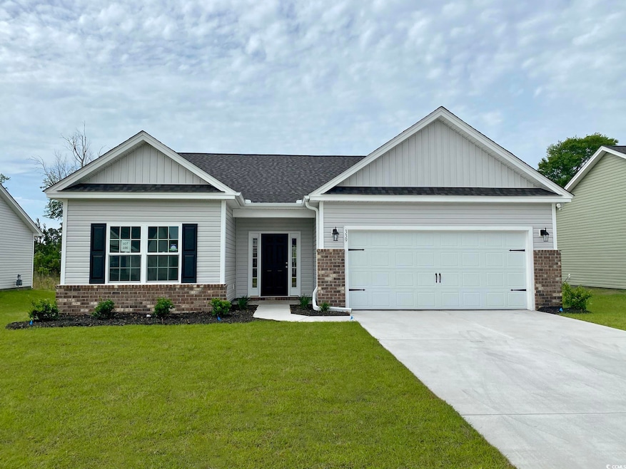 Ranch-style house with brick siding, board and batten siding, a shingled roof, and driveway