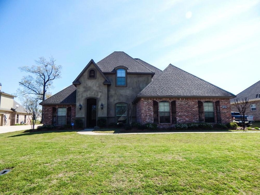 Beautiful Forest Hills home on spaciou lot.