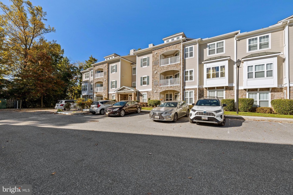 302 Wyndham Cir unit 302L, Owings Mills, MD 21117 - photo 1