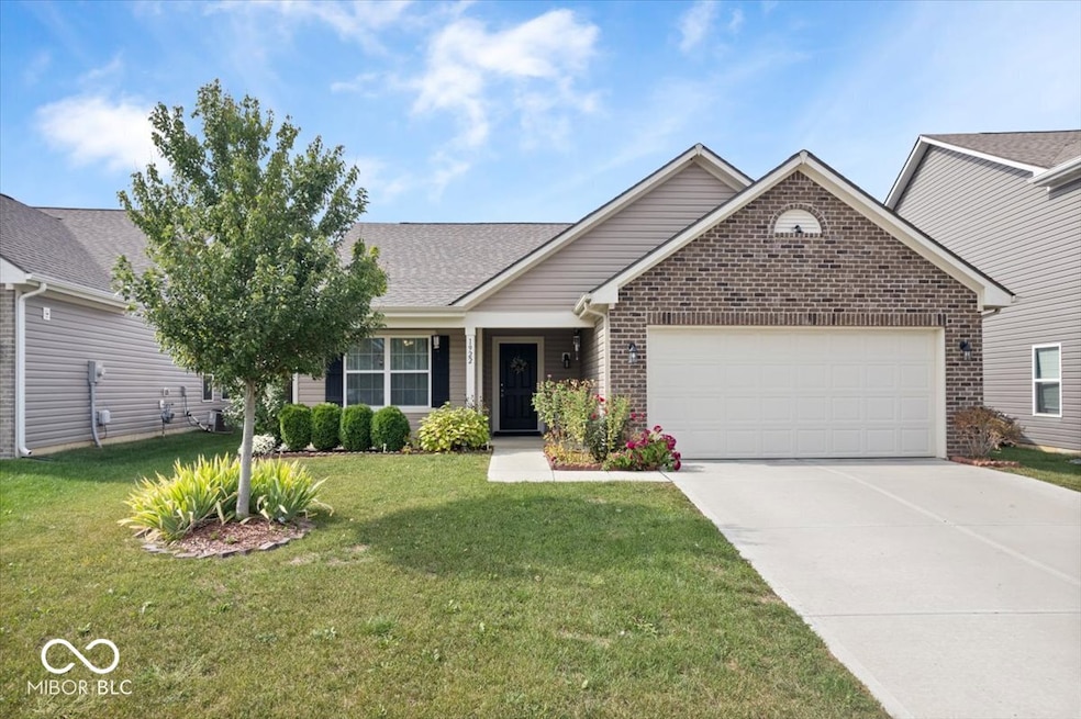 Charming three bedroom ranch on a private lot with the most charming front porch is ready for it new owners!