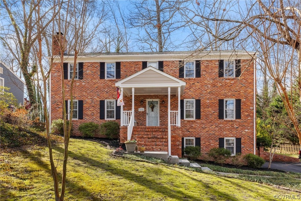 View of front of house with a front yard