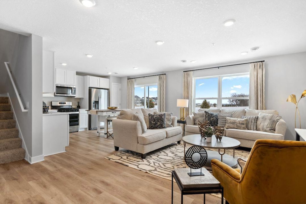 The simplicity of townhome living but the feel of a single-family home. Photo is of model home. Colors and options may vary. Ask Sales Agent for details.